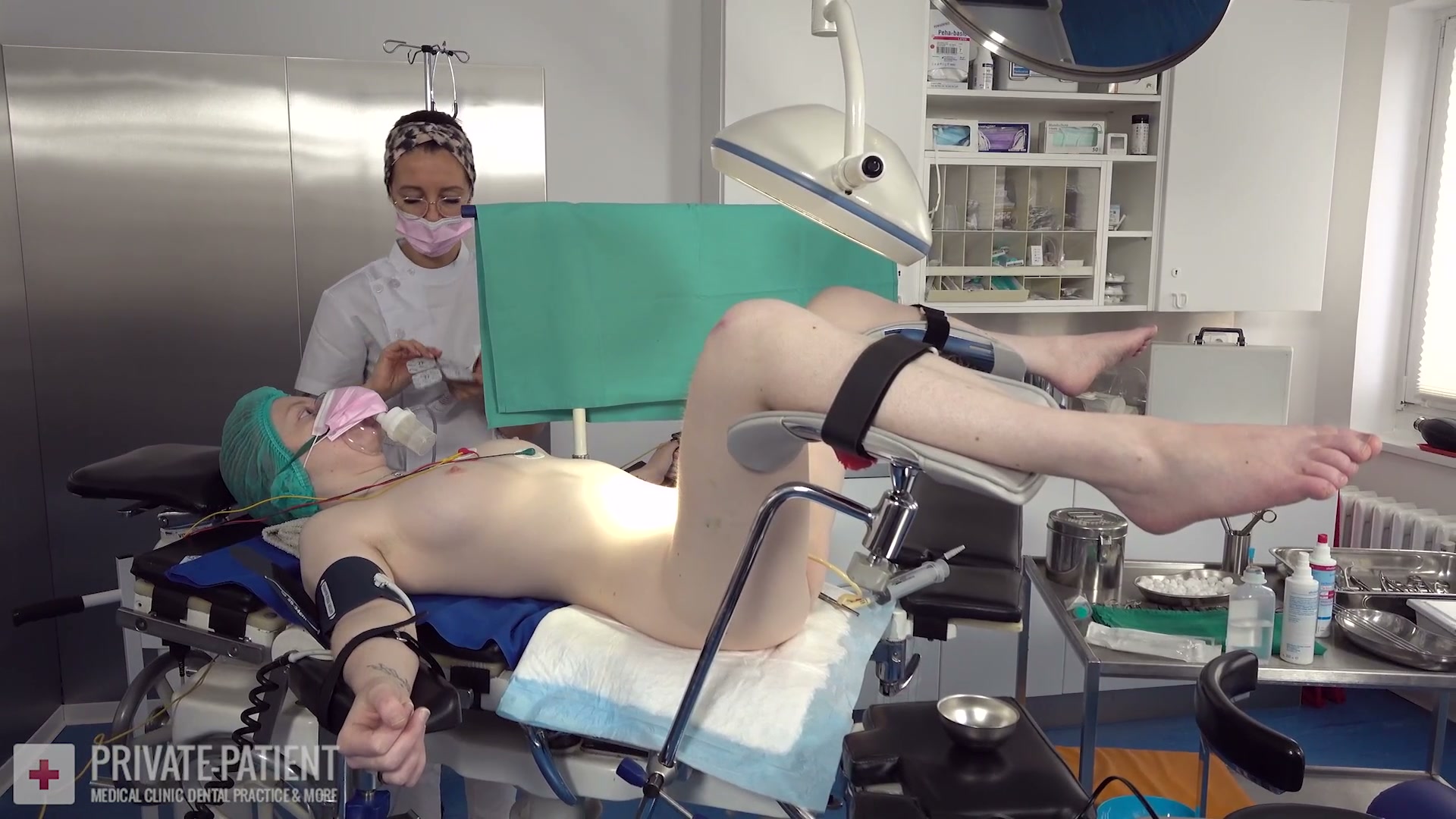 Dr. Eve exploring her lesbian side with a female private patient in the free Year End Treatment part six medical BDSM video from Amara Fetish Clinic Belgium